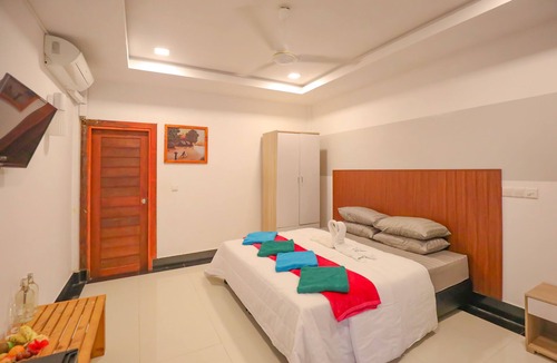 Thoddoo Bed & Breakfast | 10 mins from pristine Maldivian beach.