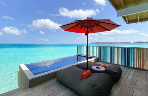 Farukolhufushi Island Hotel | Dive into Music: Overwater Villas & Underwater Tunes Await You!