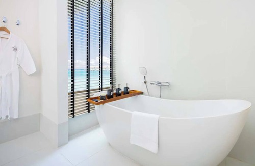 Farukolhufushi Island Hotel | Private Terrace in Maldives, Platinum Overwater Villa, Hard Rock