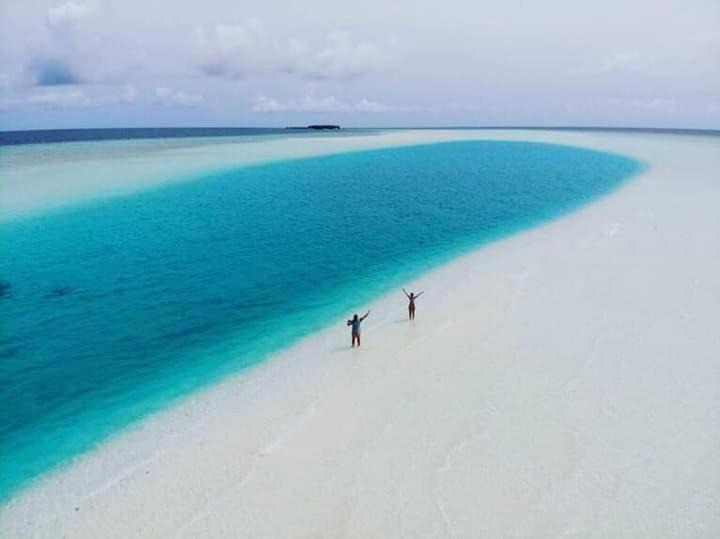 Photo of Human In Picture in Thoddoo