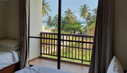 Deluxe Triple Room, Balcony, Partial Sea View