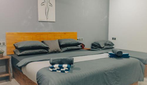 Deluxe Family Room with Balcony (10% off on Manta Snorkeling & One Trip to Nearby Dessert Island)