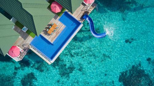 Three Bedroom Lagoon Villa with Pool + Slide - Free shared seaplane for 2 guests, minimum 7-night stay