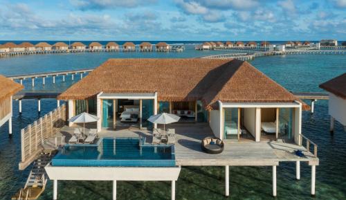 Three Bedroom Water Villa with private pool & free access to VIP seaplane lounge on arrival with $50 Spa credit & kids stay & dine free