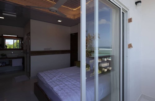 Thulusdhoo Island House | Batuta Maldives Fourson