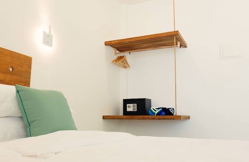 Dhigurah Bed & Breakfast | Sea view room with balcony