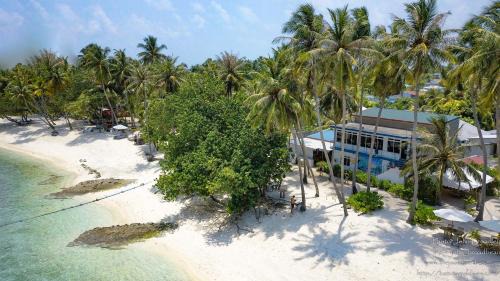 Thulusdhoo Island House | Batuta Maldives Surf View